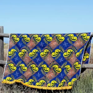 Toalla con estampado de inspiración africana. Accesorios étnicos hechos a mano que unen estilo y solidaridad.